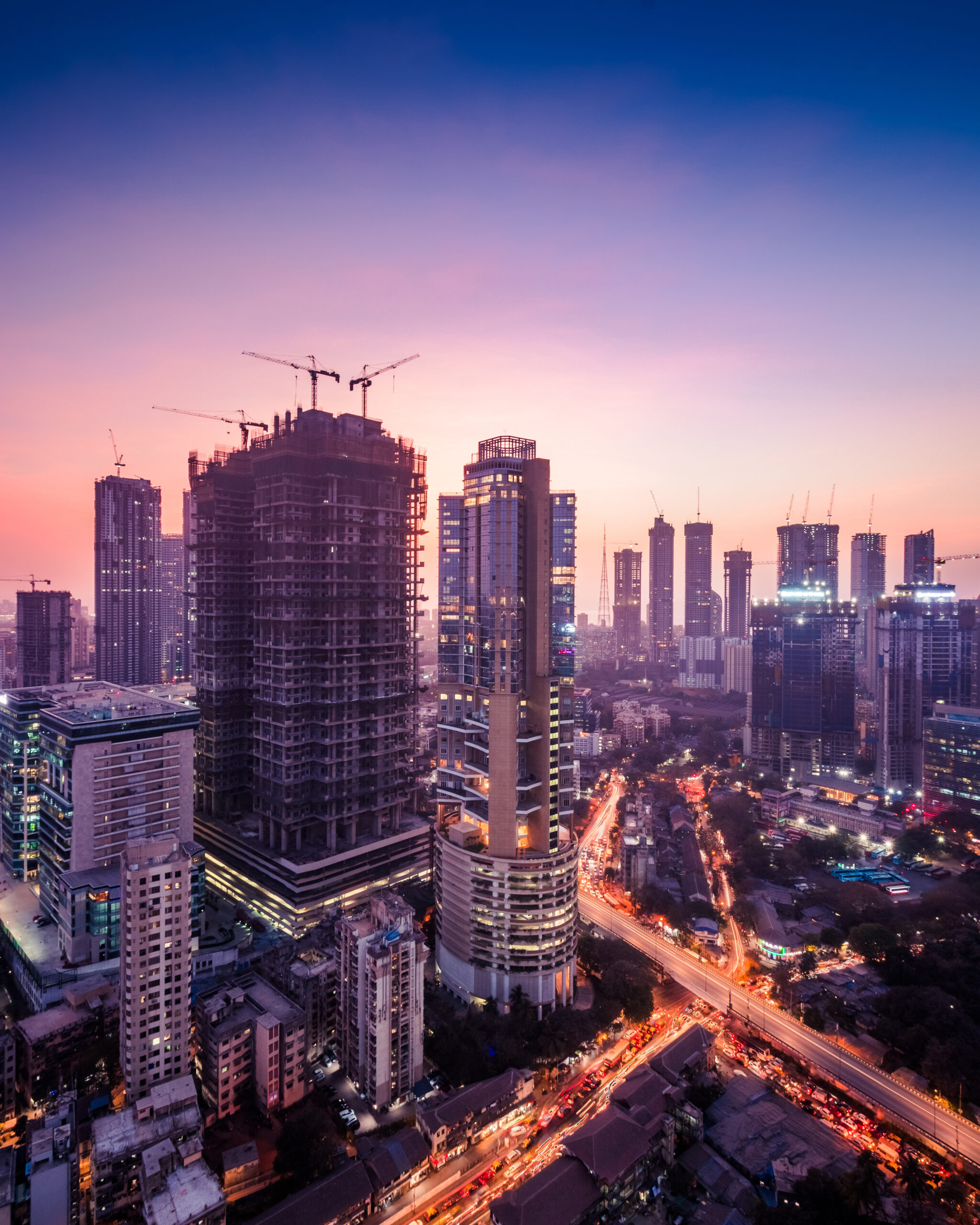 twilight-view-mumbai-cityscape-purple-hues-showing-lot-construction-residential-commercial-skyscrapers-highrises